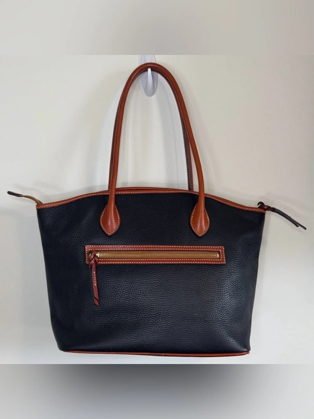 Dooney & Bourke Pebble Grain Tote bag in black with tan leather trim